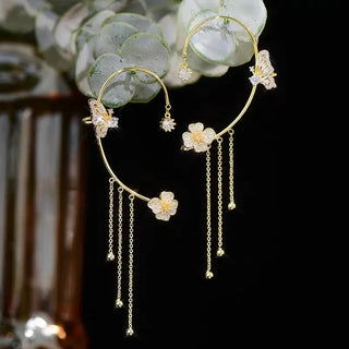 Violet™ — Boucles d’oreilles papillon élégance lumineuse